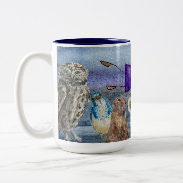 Tasse 2 Couleurs Tasse#2 Joanna volant au-dessus des animaux (Gauche)