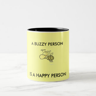 TASSE 2 COULEURS UNE PERSONNE DE BUZZY EST UNE PERSONNE HEUREUSE !
