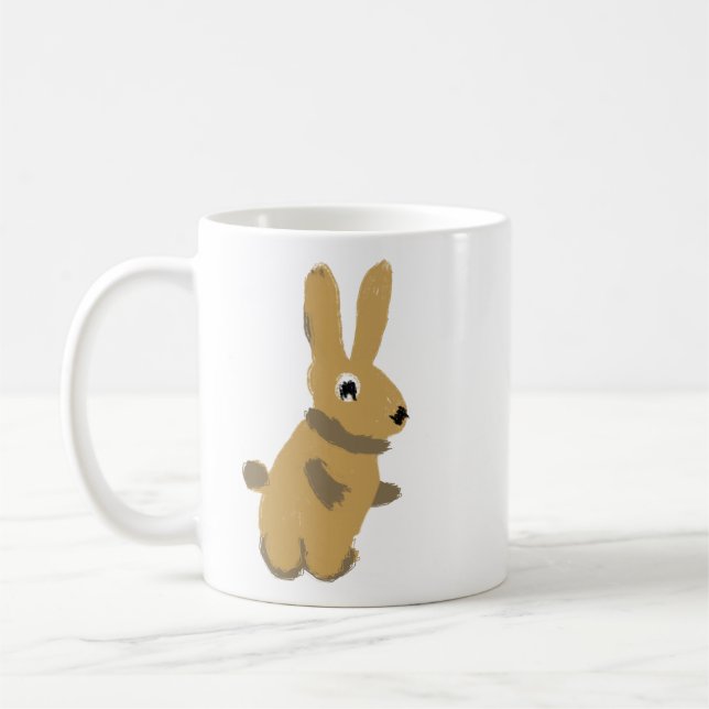 Tasse à café avec un lapin mignon et fantaisiste d (Gauche)