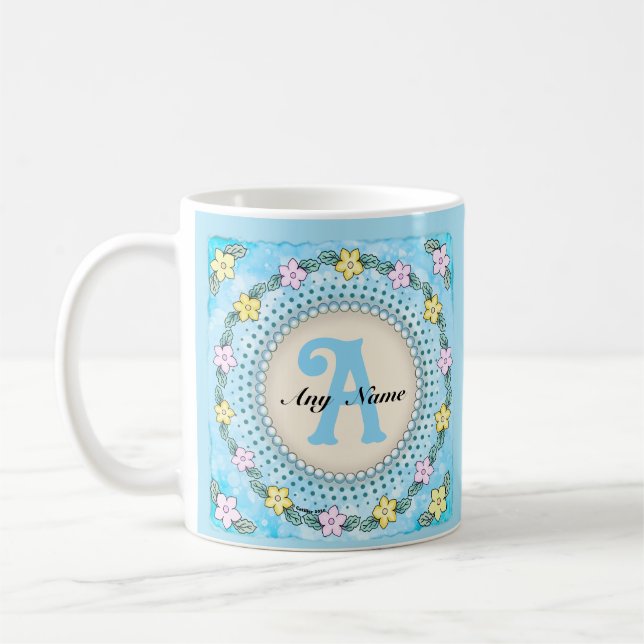 Tasse à monogramme à bordure de fleurs (Gauche)