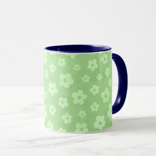 Tasse à thé aux fleurs vertes et blanches avec poi
