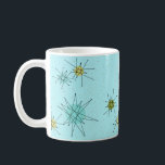 Tasse atomique bleue de Starbursts des oeufs de<br><div class="desc">Le motif atomique iconique bleu de tasse de Starbursts des oeufs de ce Robin comporte les starbursts atomiques iconiques. C'est exact ! La vieille école, arrière - plan coloré par bleu des oeufs du merle avec des taches d'or est le contexte parfait pour la turquoise vibrante, le céleri calmant, et...</div>
