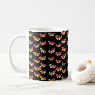 Tasse avec papillons sur fond noir