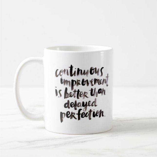 Tasse blanche classique "continue d'amélioration… (Gauche)