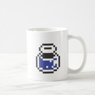 Tasse bleue de breuvage magique