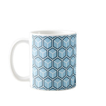 Tasse chaude de boissons de motif bleu de nid