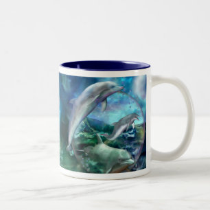Tasse d'art de trois dauphins