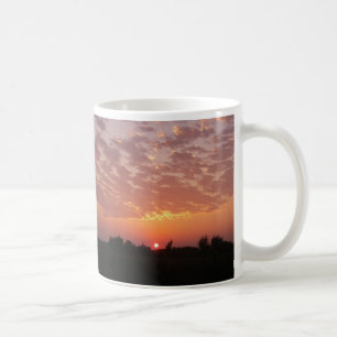 Tasse de beauté de coucher du soleil