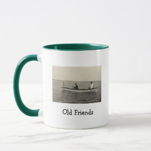Tasse de café avec ancienne photo de voileurs Amis