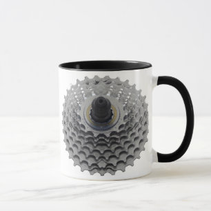 Tasse de café avec le pignon de vélo