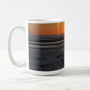 Tasse de café avec photo du coucher de soleil sur