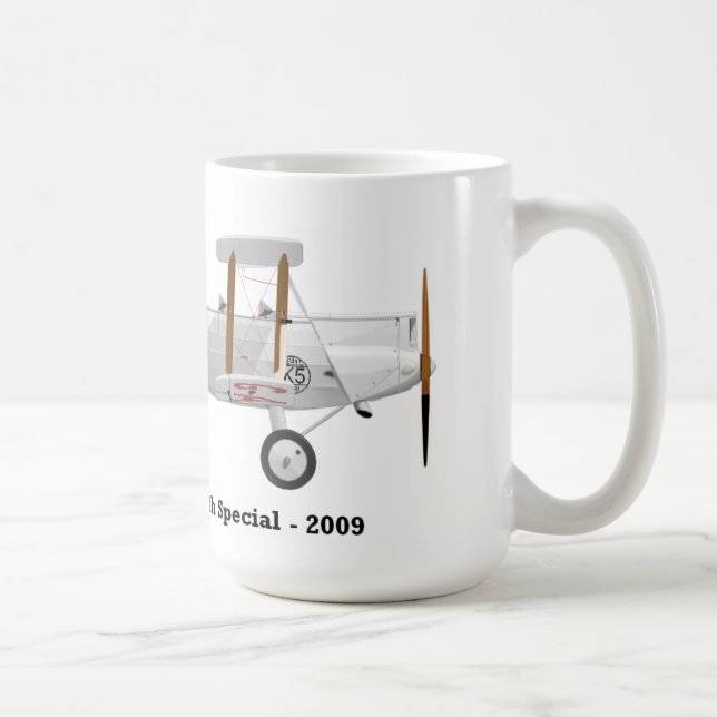 Tasse de café avec un biplan là-dessus (Droite)