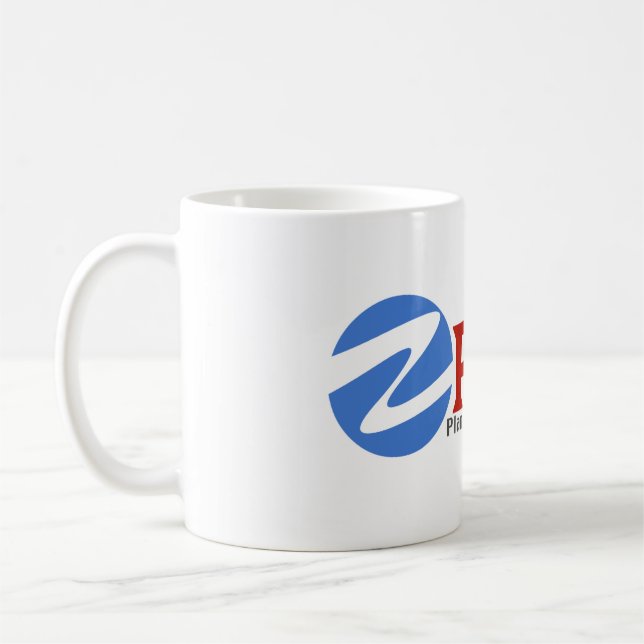 Tasse de café blanc de l'électronique du monde de (Gauche)