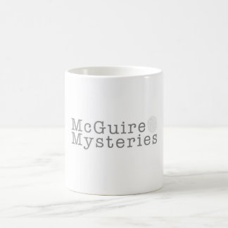 Tasse de café de logo de mystères de McGuire