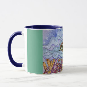 Tasse de café de yeux de poissons d'océan