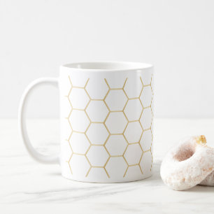 Tasse de café d'or de nid d'abeilles