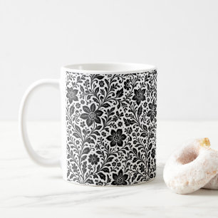 Tasse de café élégante en monochrome avec motif fl