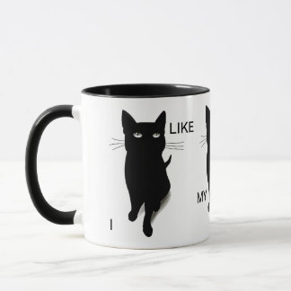 Tasse de café fraîche de chat noir par des
