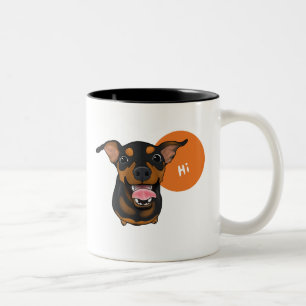 Tasse de café heureuse de chien de Pinscher