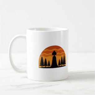 Tasse de café silhouette du coucher de soleil du m