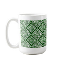 Tasse de café verte de médaillons