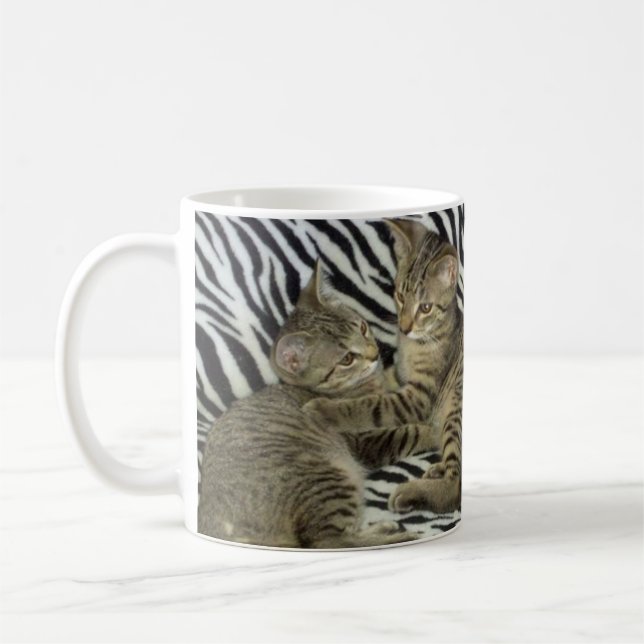 Tasse de chatons de délivrance (Gauche)