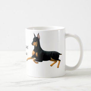 Tasse de chien de Pincher de dobermann