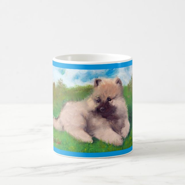 Tasse de chiot de Keeshond de "Havel" (Centre)