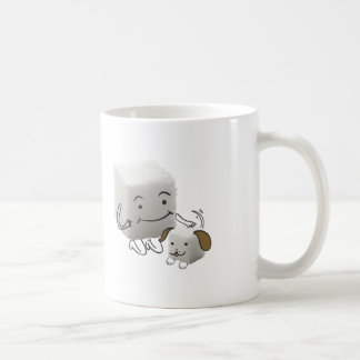 Tasse de cube en sucre avec le chien de cube en
