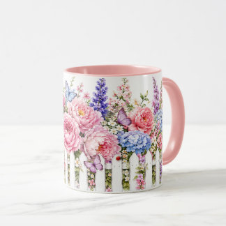 Tasse de jardin papillon à clôture blanche florale