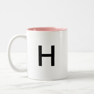 Tasse de la lettre initiale "H"