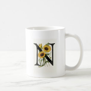 Tasse de la marguerite N de monogramme