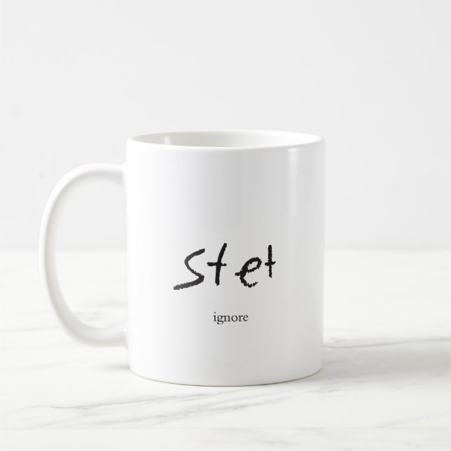 tasse de la marque de correcteurs d'épreuves -- (Gauche)