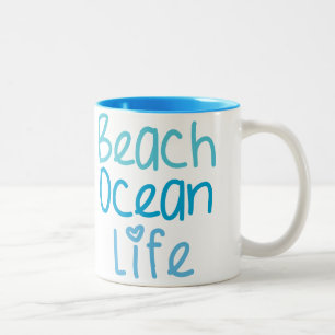 Tasse de la vie d'océan de plage