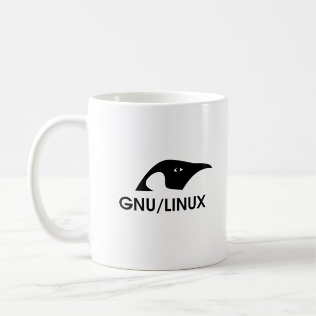Tasse de logo de pingouin de GNU/Linux avec la (Gauche)