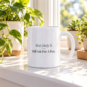 Tasse de Noël « Demandera encore un poney »