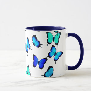 Tasse de papillons de jungle de vert bleu