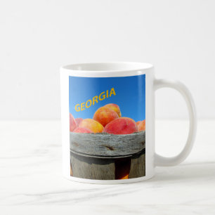 Tasse de pêches de la Géorgie