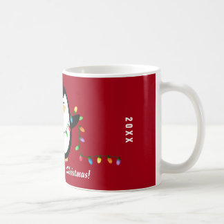 Tasse de pingouin de lumières de Joyeux Noël