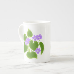 Tasse de porcelaine tendre de violettes de région