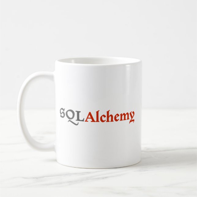 Tasse de SQLAlchemy avec le slogan (Gauche)