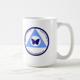 Tasse de symbole d'Alanon