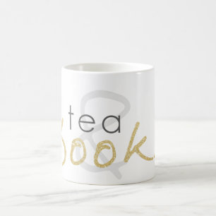 Tasse de thé d'étincelle d'or et de café de liv