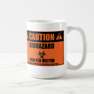 Tasse de victime de grippe d'homme