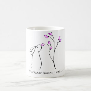 Tasse douce de logo de lapin