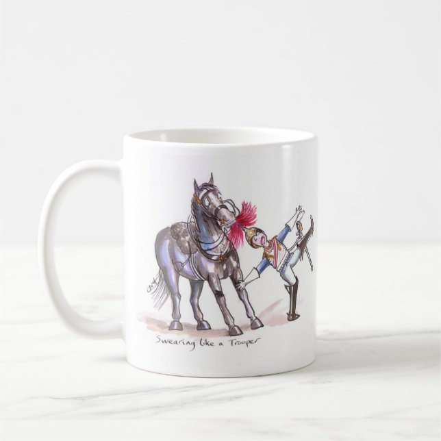 Tasse drôle de bande dessinée de bleus et de (Gauche)