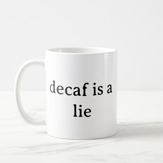 Tasse drôle de l'amant de café disant Décap est un (Gauche)