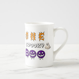 Tasse En Porcelaine Citrouille souriante Jack O Lantern avec un tas de