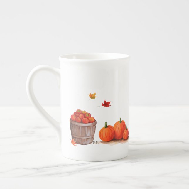 Tasse En Porcelaine Jour d'automne avec les pommes et le râteau de (Gauche)
