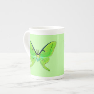 Tasse En Porcelaine Luna moth sur un arrière - plan vert pâle